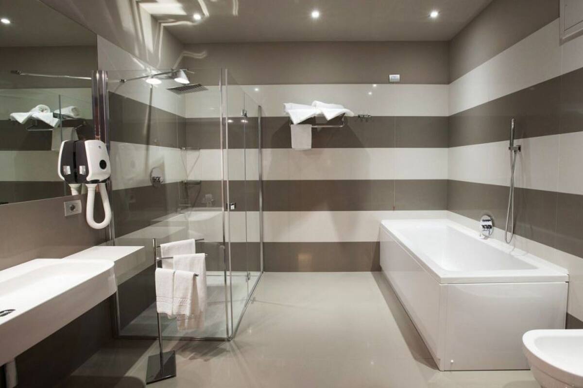 shower, rainfall showerhead, designer toiletries, hair dryer