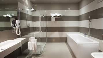Shower, rainfall showerhead, designer toiletries, hair dryer