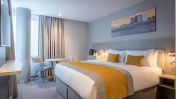 Premium bedding, in-room safe, desk, soundproofing