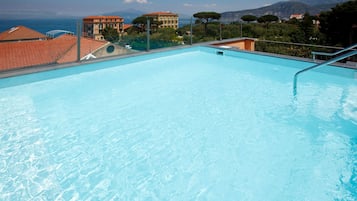 Seasonal outdoor pool, pool umbrellas