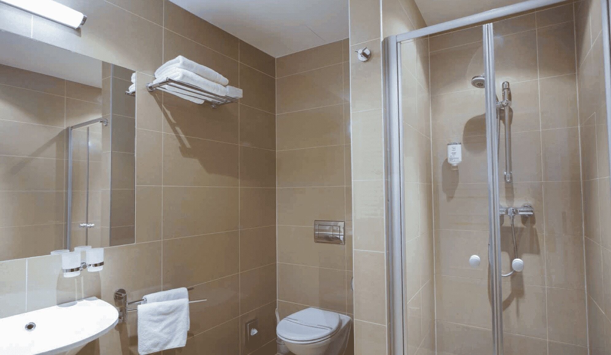 family room | bathroom | shower, free toiletries, hair dryer, towels