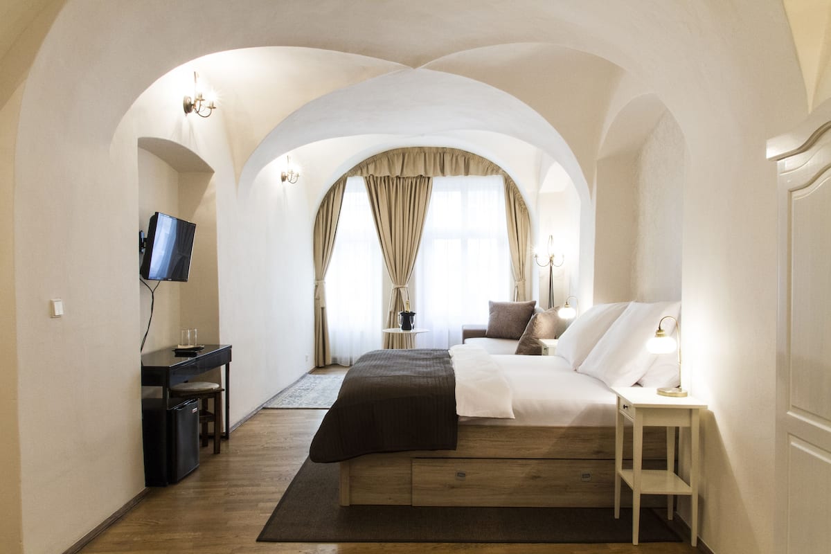 Habitación cuádruple | Ropa de cama hipoalergénica y minibar