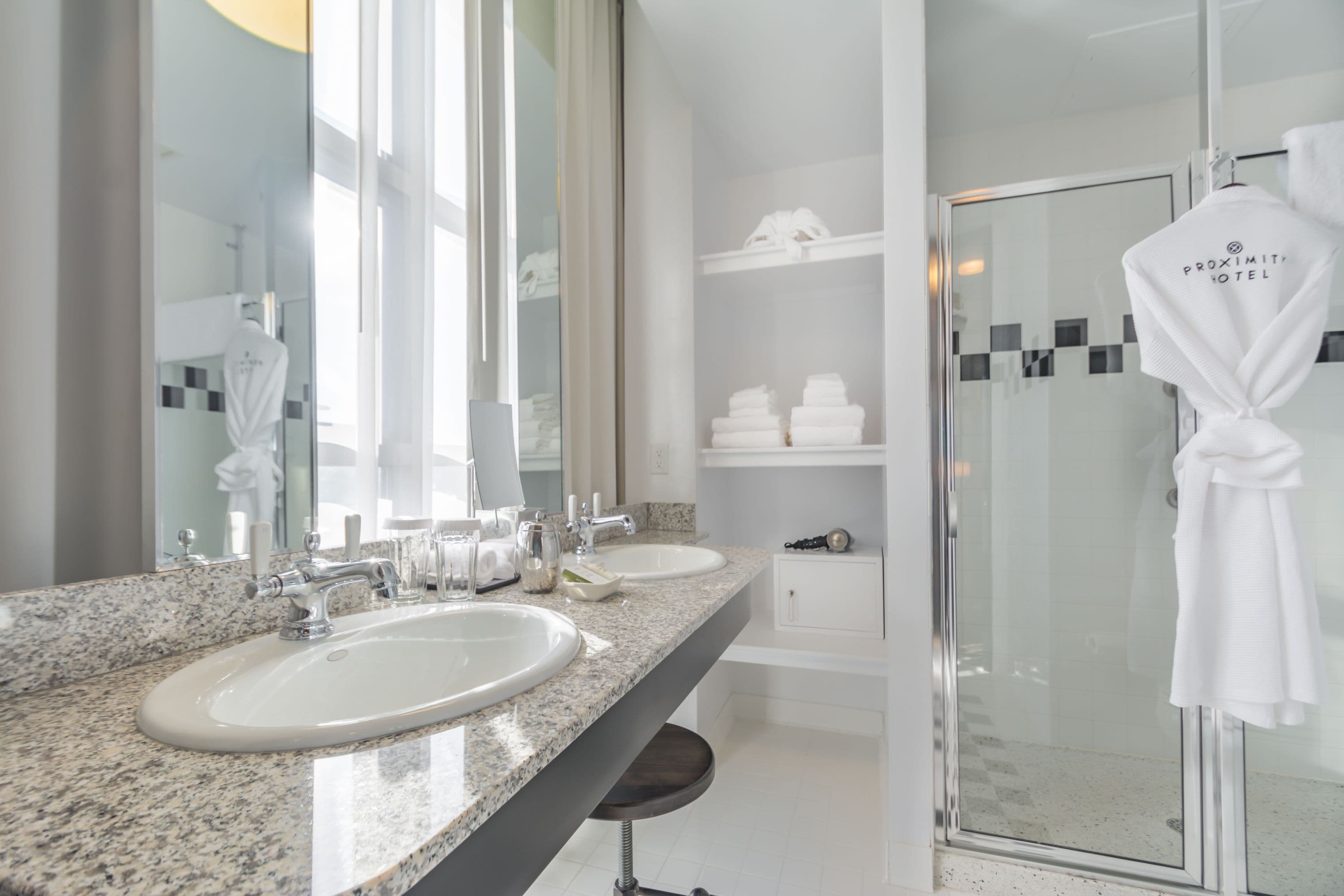 premium loft, 1 king bed | bathroom | designer toiletries, hair dryer, bathrobes, towels