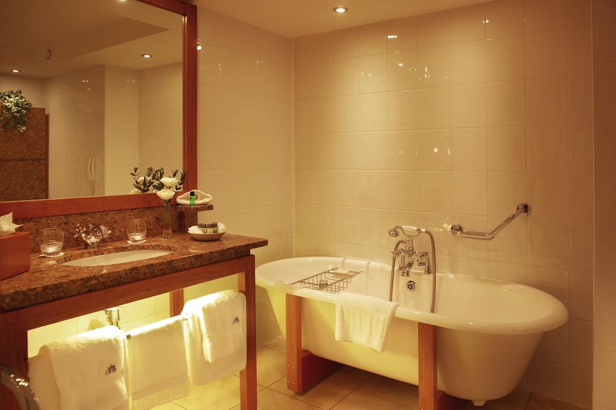 rainfall showerhead, designer toiletries, hair dryer, bathrobes