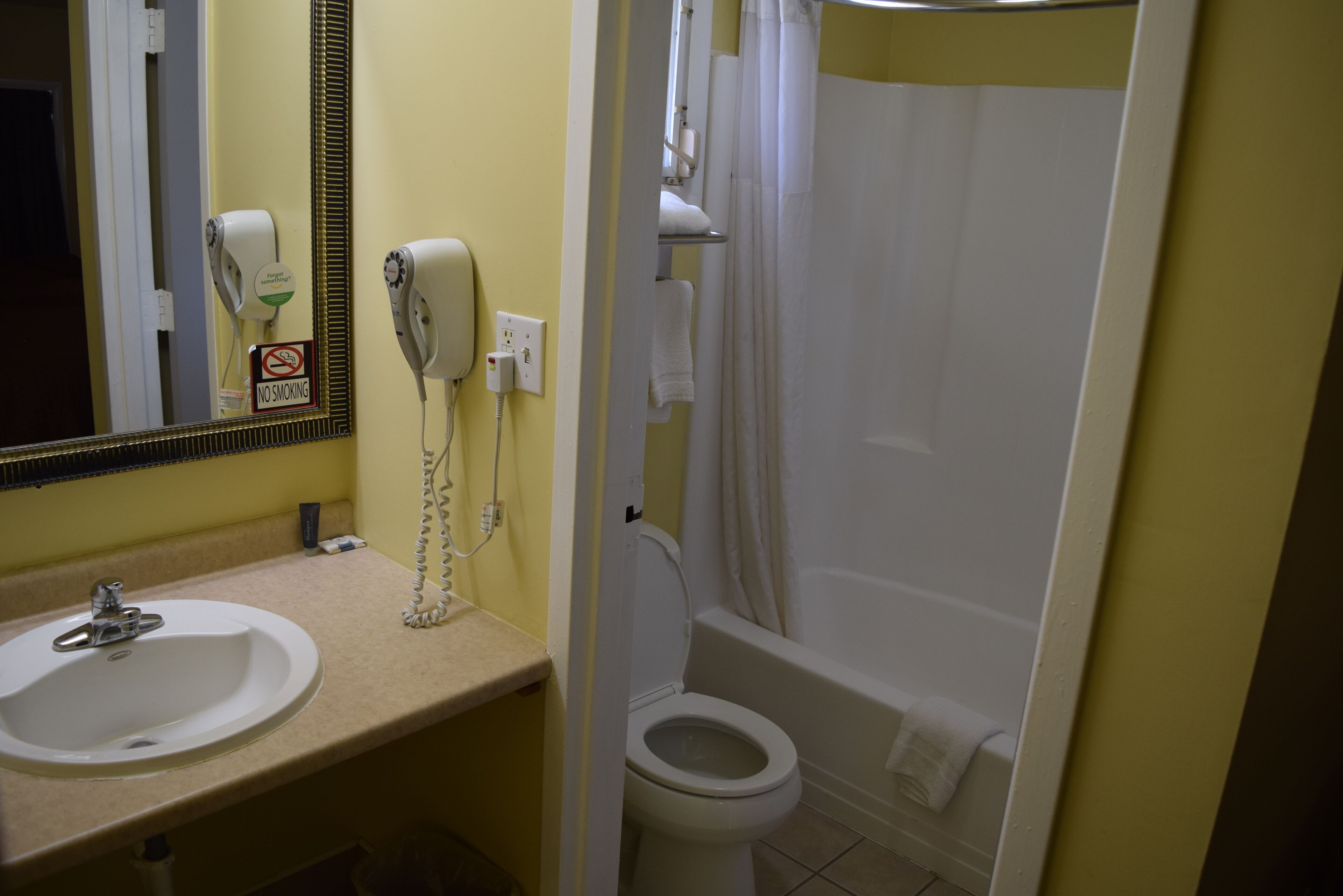 Standard Room, 2 Queen Beds | Bathroom | Free toiletries, hair dryer, towels