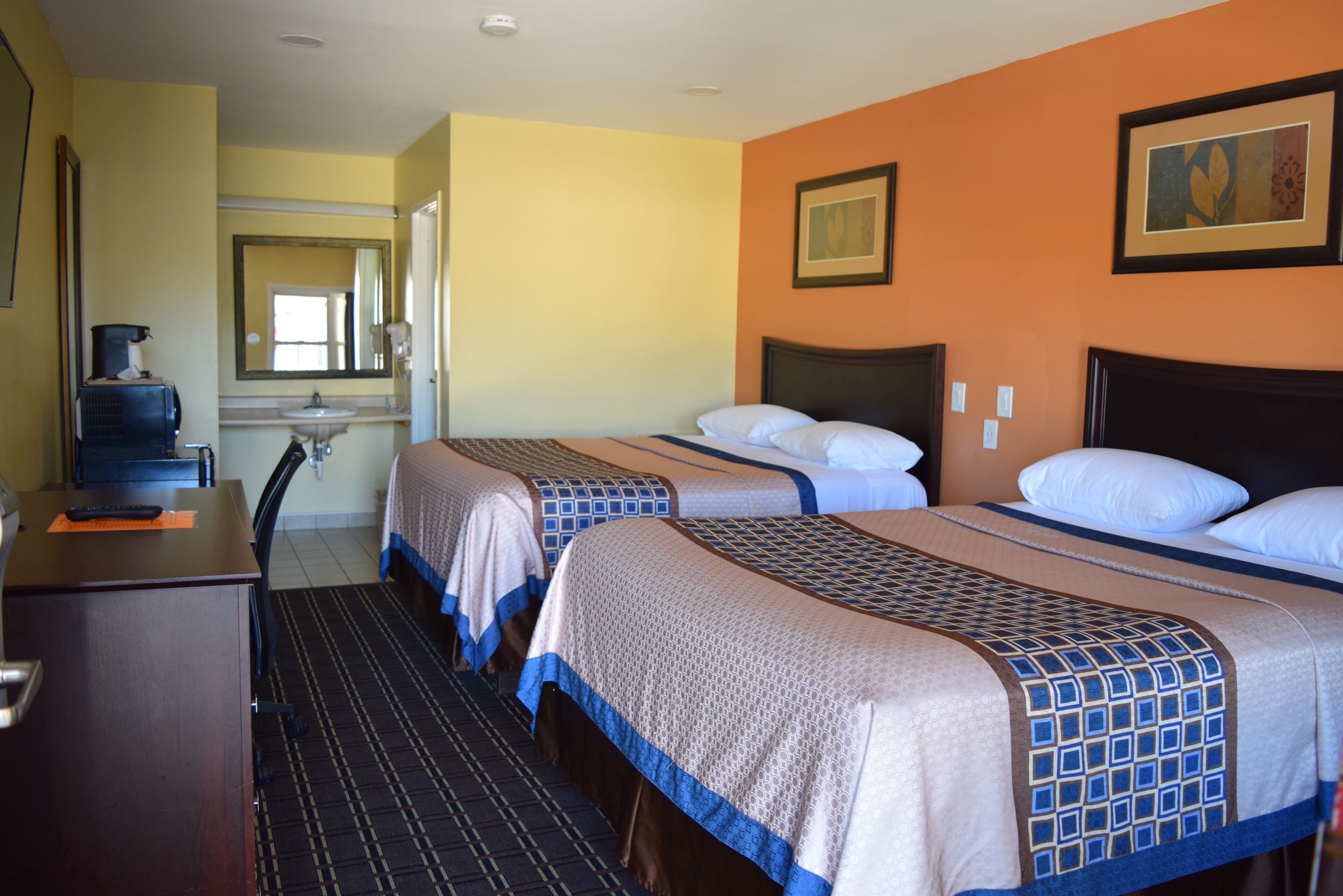 Standard Room, 2 Queen Beds | Desk, iron/ironing board, free WiFi, bed sheets