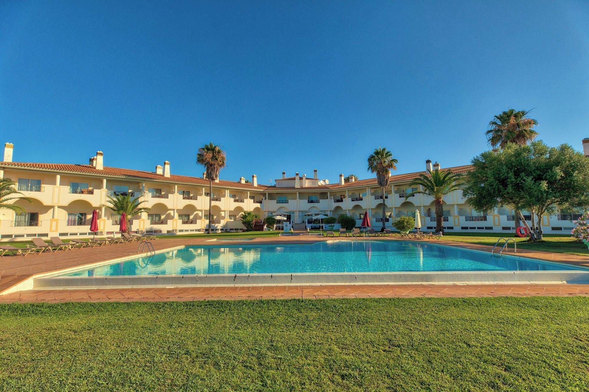 Outdoor pool, pool umbrellas, pool loungers