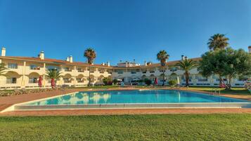 Outdoor pool, pool umbrellas, pool loungers