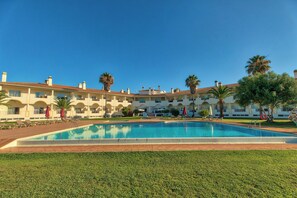 Outdoor pool, pool umbrellas, pool loungers