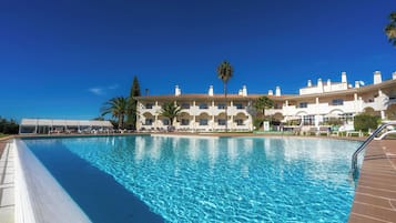 Outdoor pool, pool umbrellas, pool loungers