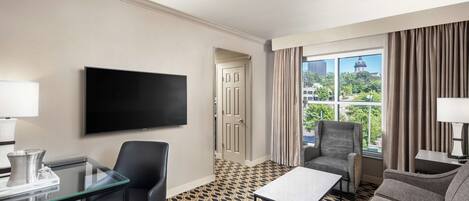 In-room safe, desk, iron/ironing board, cribs (free)