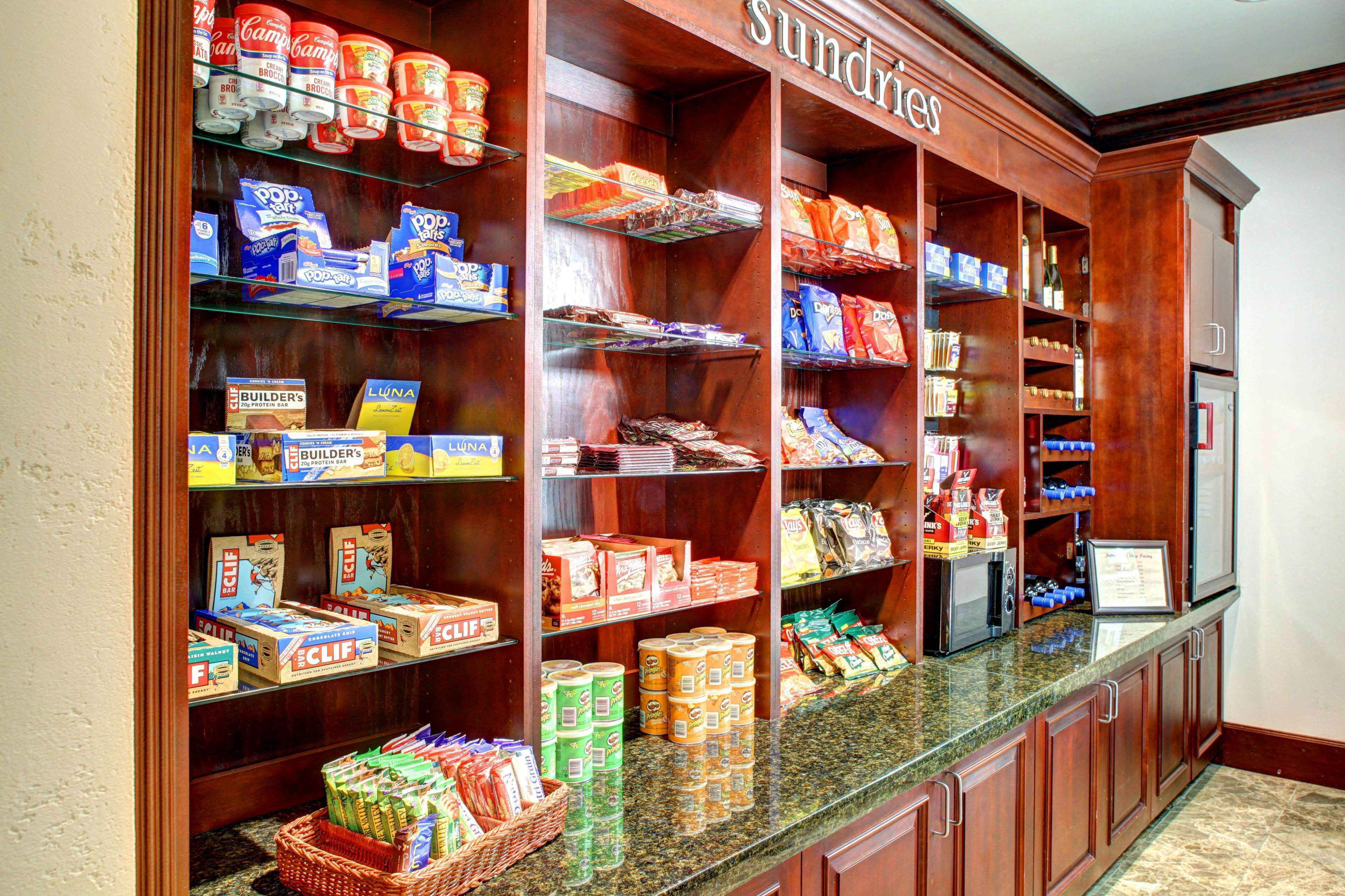 A self-service food station with various packaged goods and snacks.