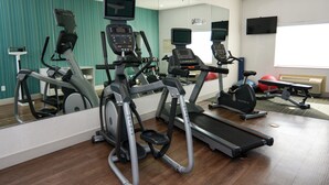 A gym with treadmills, stationary bikes, and exercise balls. - Holiday Inn Express & Suites New Boston by IHG (New Boston)