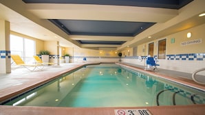 An indoor swimming pool with a 'No Diving' sign, lounge chairs, and a '3 FT 9 IN' depth marker. - Fairfield Inn & Suites by Marriott Cordele (Cordele)