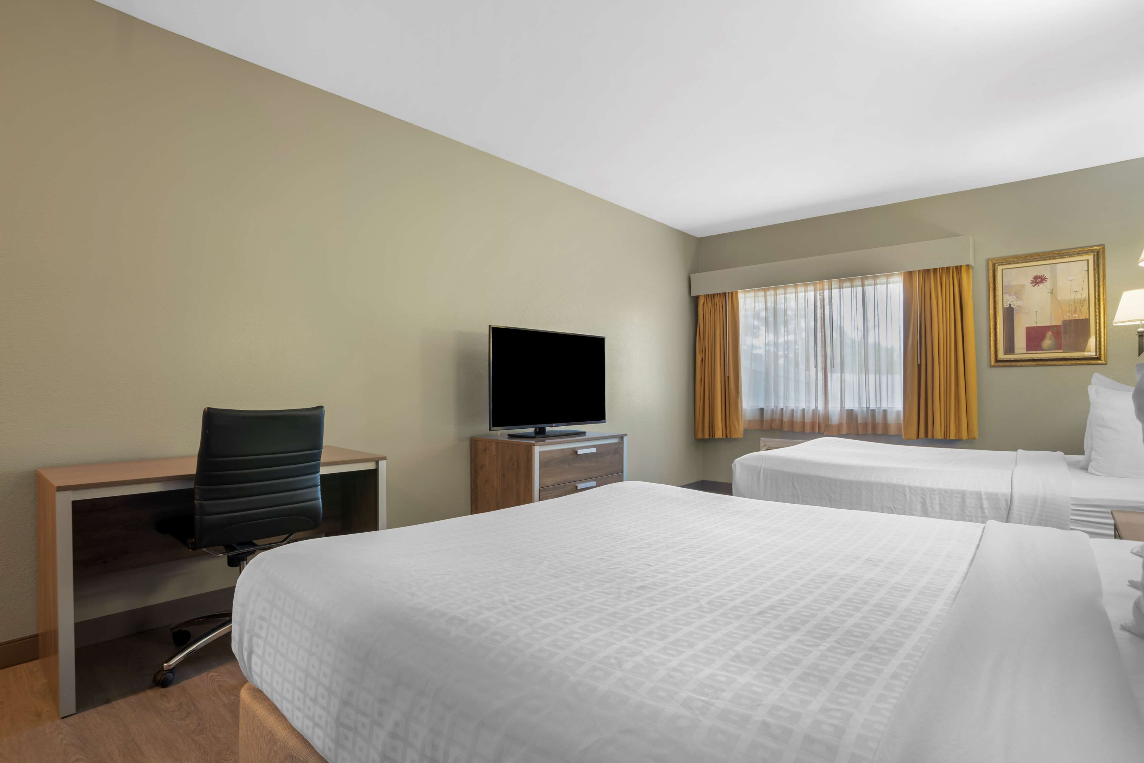 standard room, 2 queen beds, non smoking, refrigerator & microwave | premium bedding, desk, laptop workspace, blackout curtains