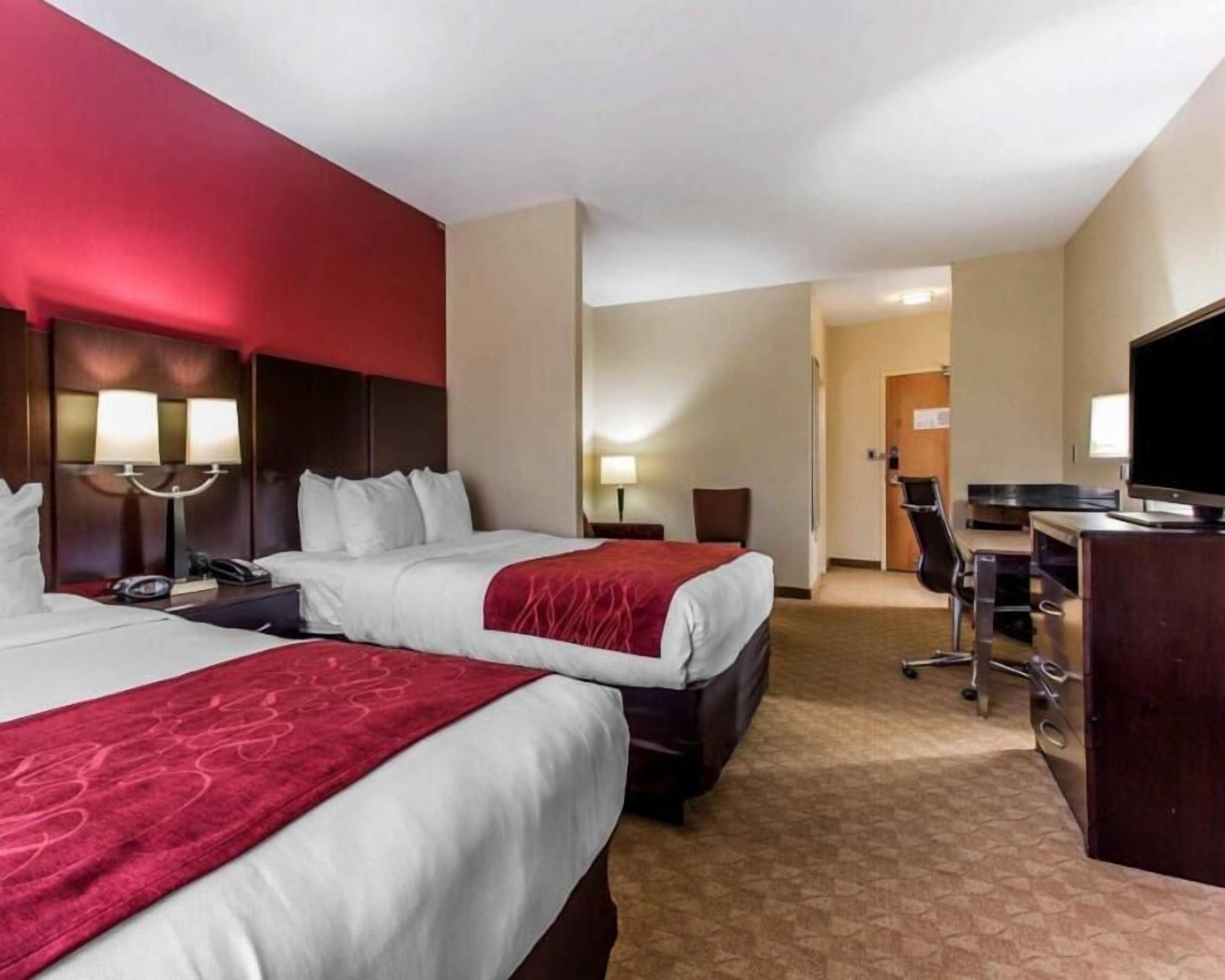Luxe beddengoed, pillowtop-bedden, een kluis op de kamer