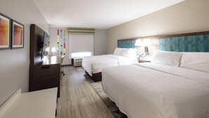 A hotel room with two beds, a desk, a TV, and a window with blinds. - Hampton Inn Dade City - Zephyrhills (Dade City)