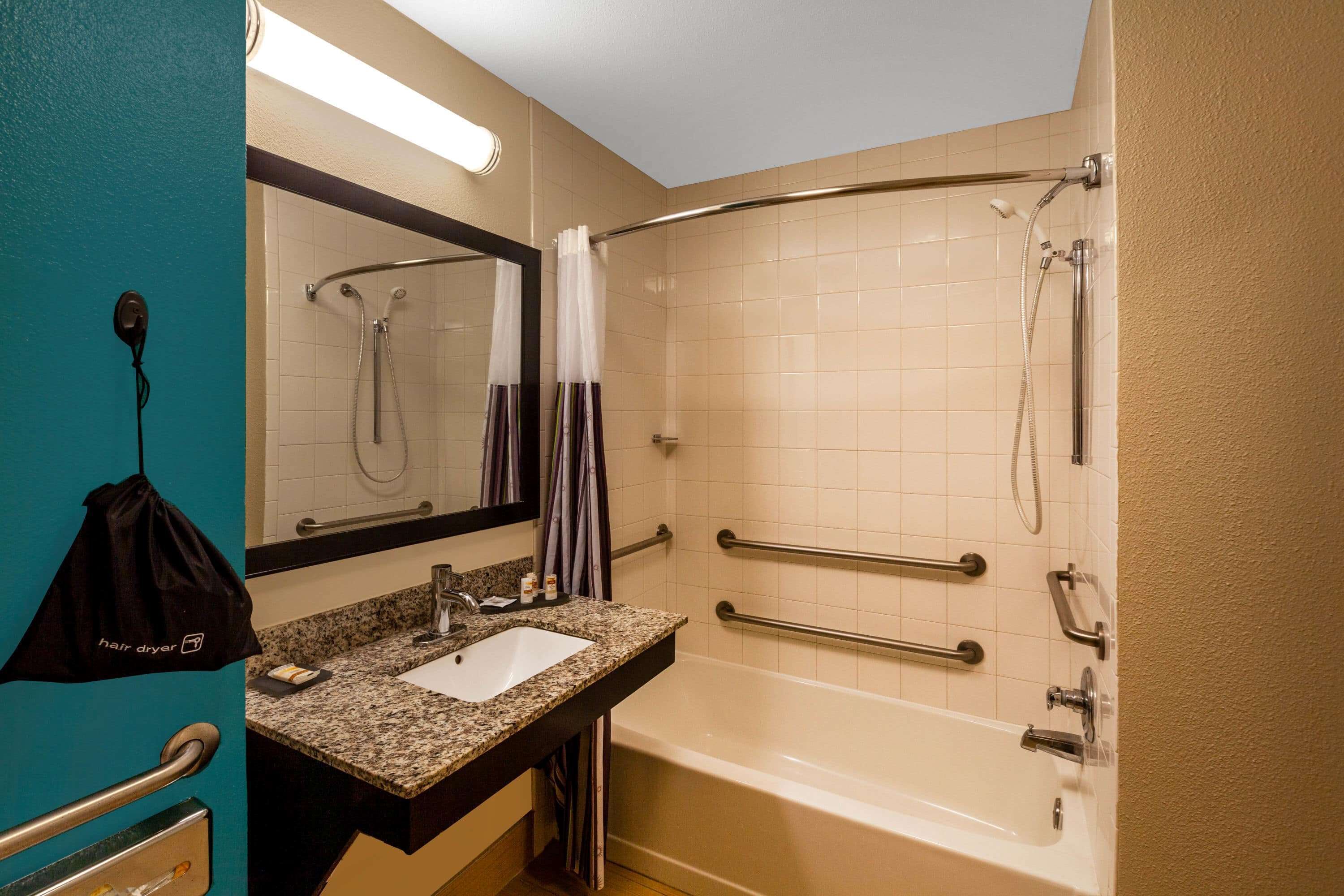 suite, 1 queen bed, accessible, non smoking (mobility/hearing impaired accessible) | bathroom | combined shower/bathtub, free toiletries, hair dryer, towels