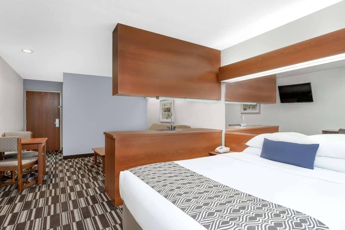 Premium bedding, desk, blackout drapes, iron/ironing board