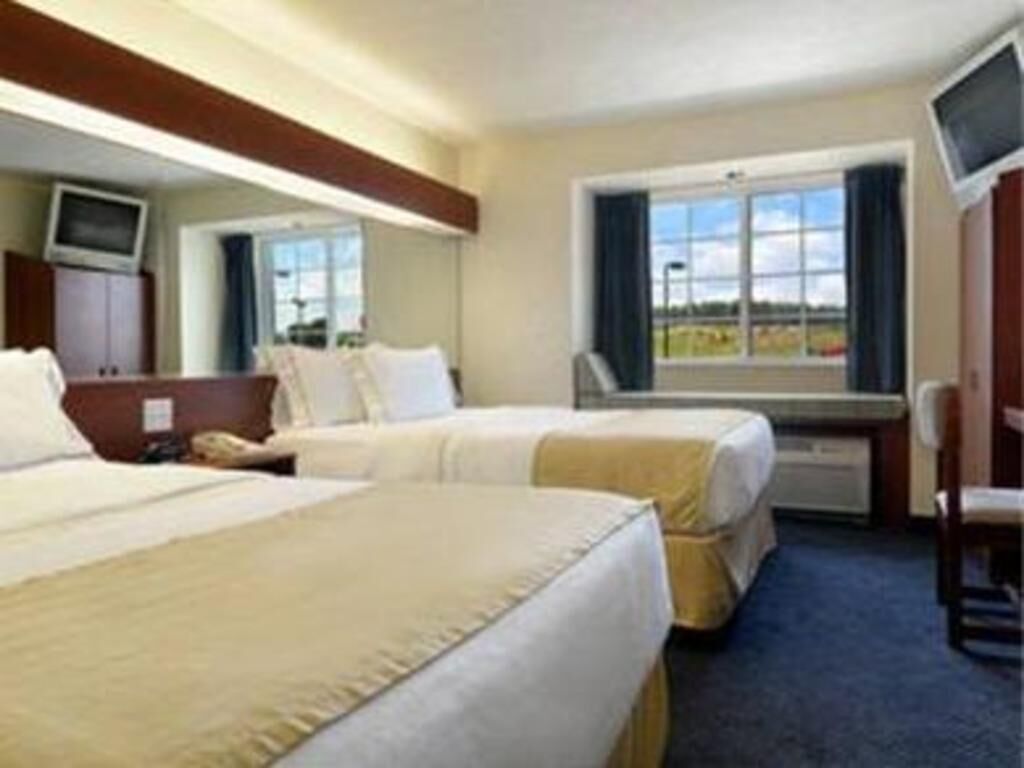 Premium bedding, desk, blackout drapes, iron/ironing board