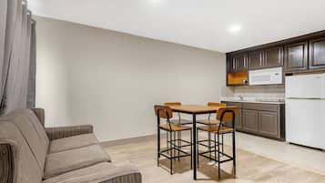 Suite, 1 King Bed, Non Smoking, Kitchenette | Desk, laptop workspace, blackout curtains, free WiFi