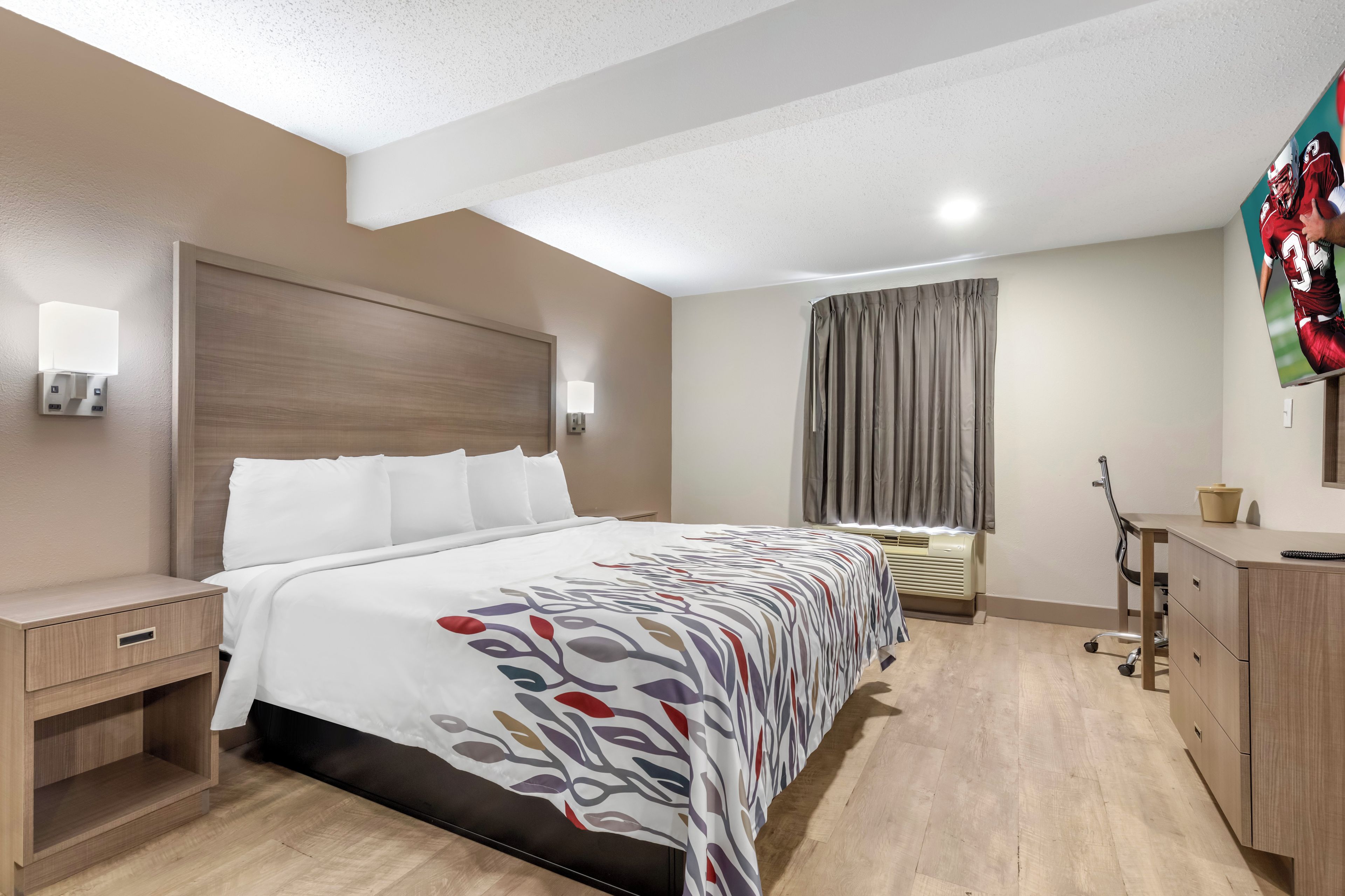 Suite, 1 King Bed, Non Smoking, Kitchenette | Desk, laptop workspace, blackout curtains, free WiFi
