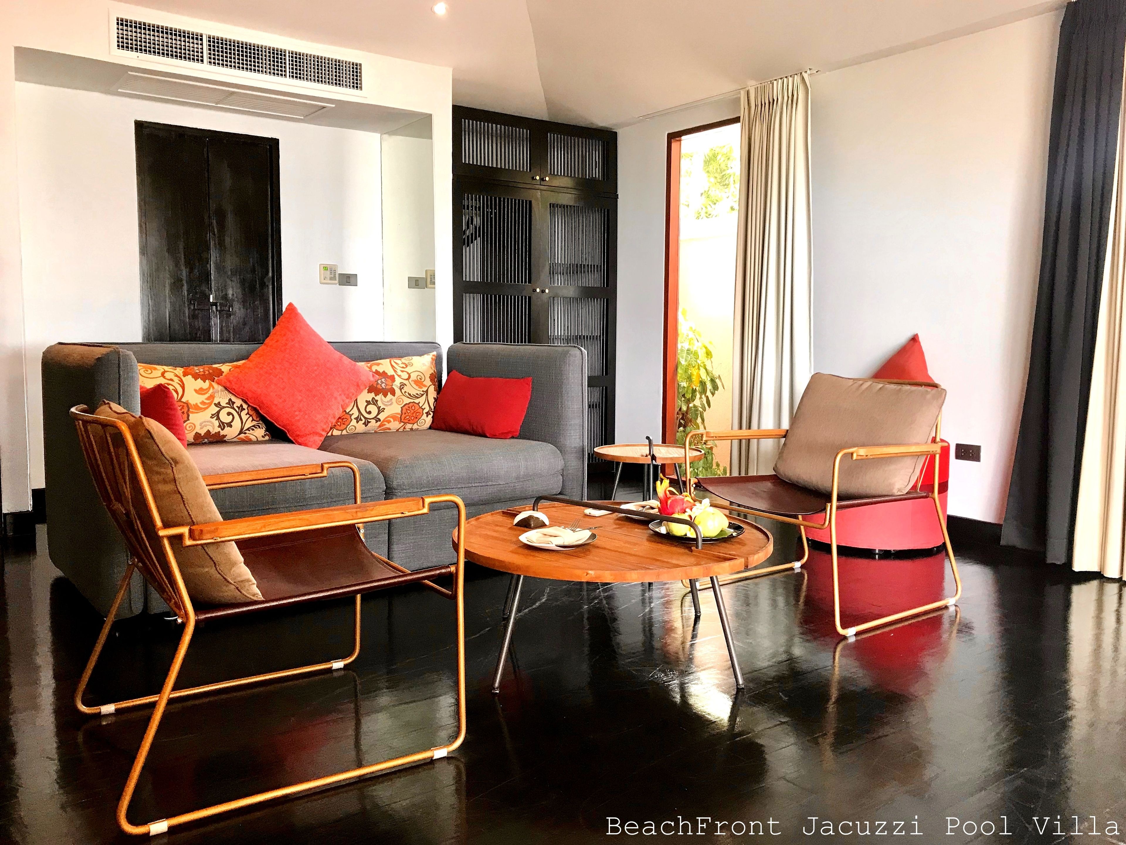 beachfront jacuzzi villa | living area | 42-inch lcd tv with satellite channels, tv