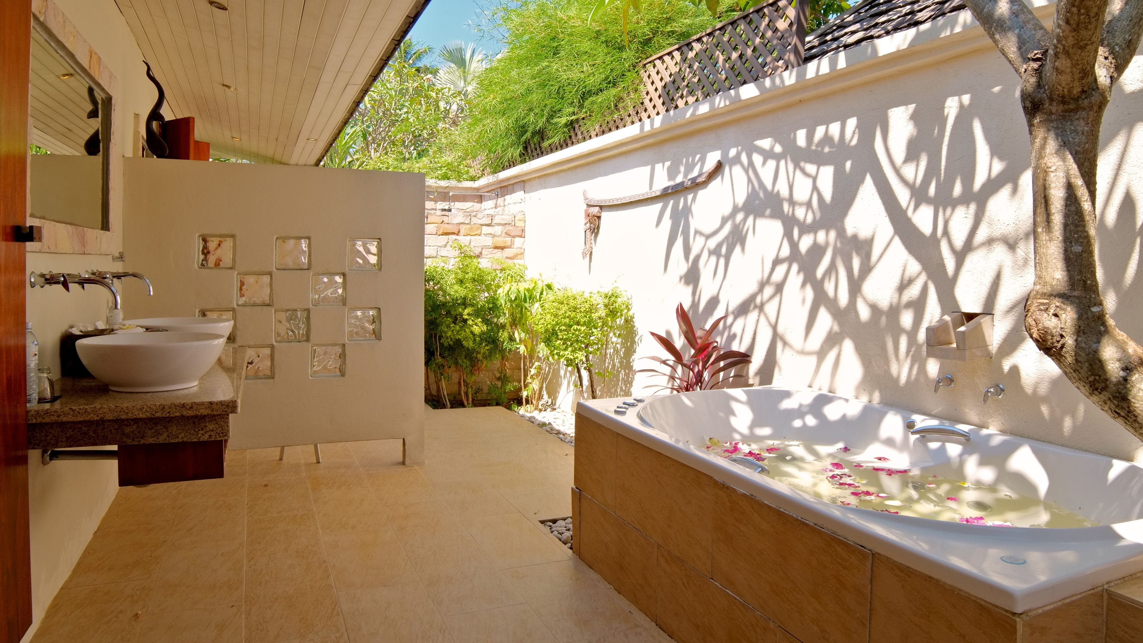 beachfront jacuzzi villa | deep-soaking bathtub
