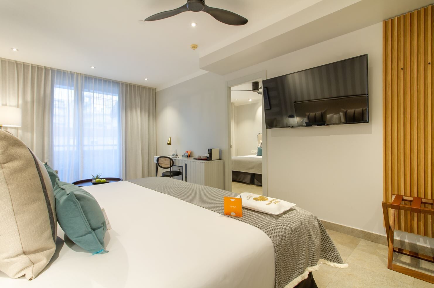 family room | 1 bedroom, premium bedding, minibar, in-room safe