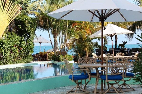 2 outdoor pools, pool umbrellas, pool loungers