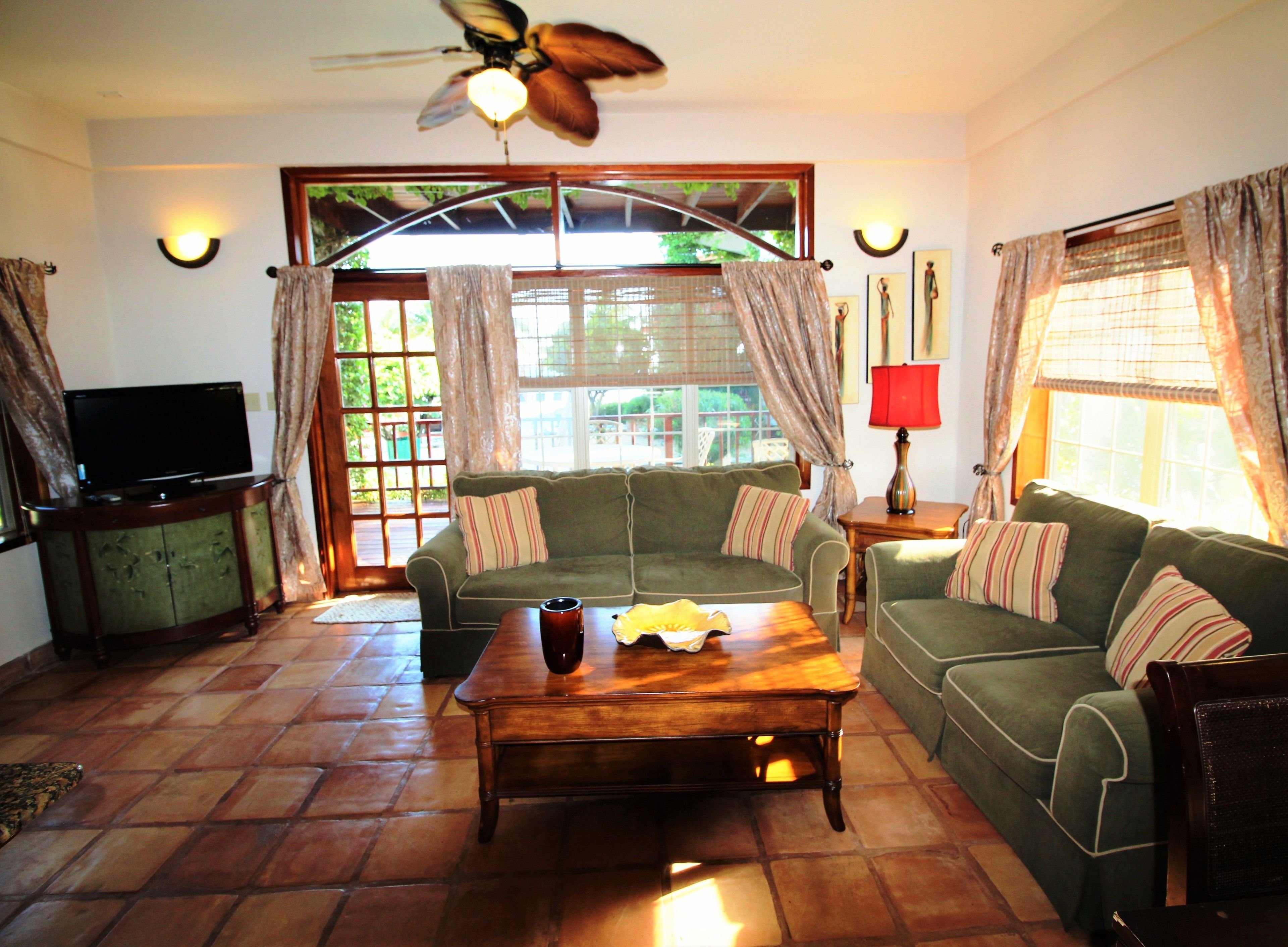 luxury villa, 1 bedroom, partial ocean view (ground floor) | living area | 42-inch flat-screen tv with cable channels, tv, dvd player