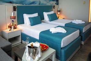 Ropa de cama de alta calidad y minibar