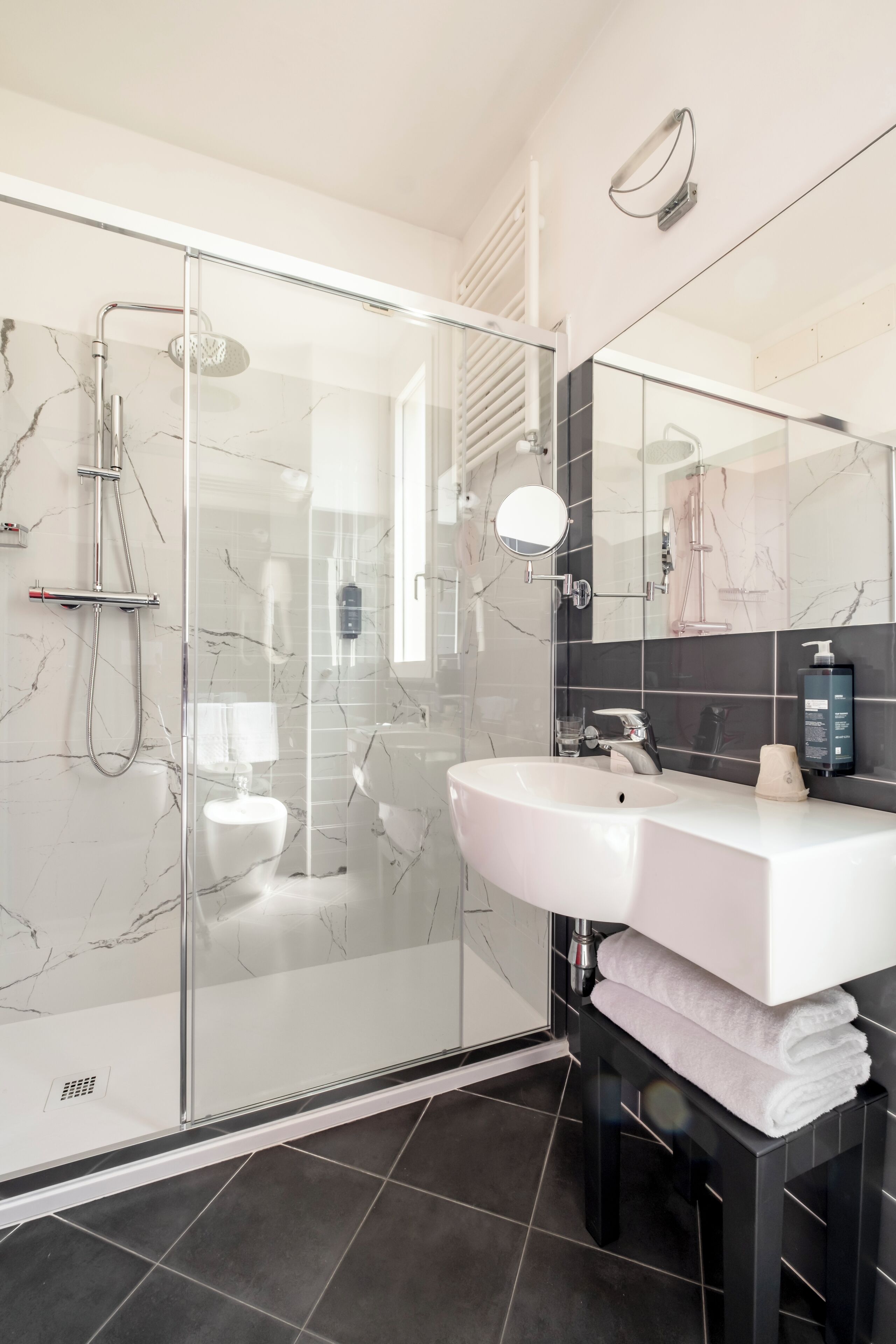 junior suite, 1 queen bed with sofa bed | bathroom | shower, rainfall showerhead, free toiletries, hair dryer