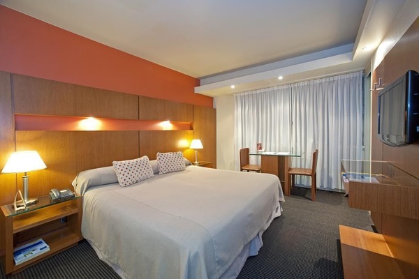 Memory-foam beds, minibar, in-room safe, desk