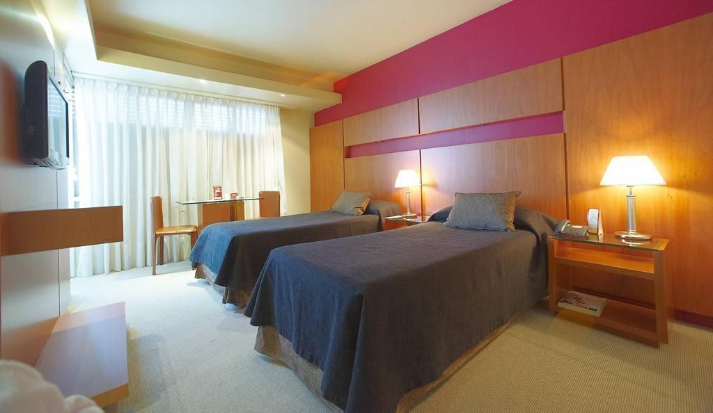 Memory-foam beds, minibar, in-room safe, desk