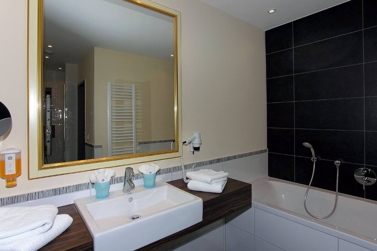 premium suite, 1 king bed (cozy sitting corner) | bathroom | hair dryer, towels