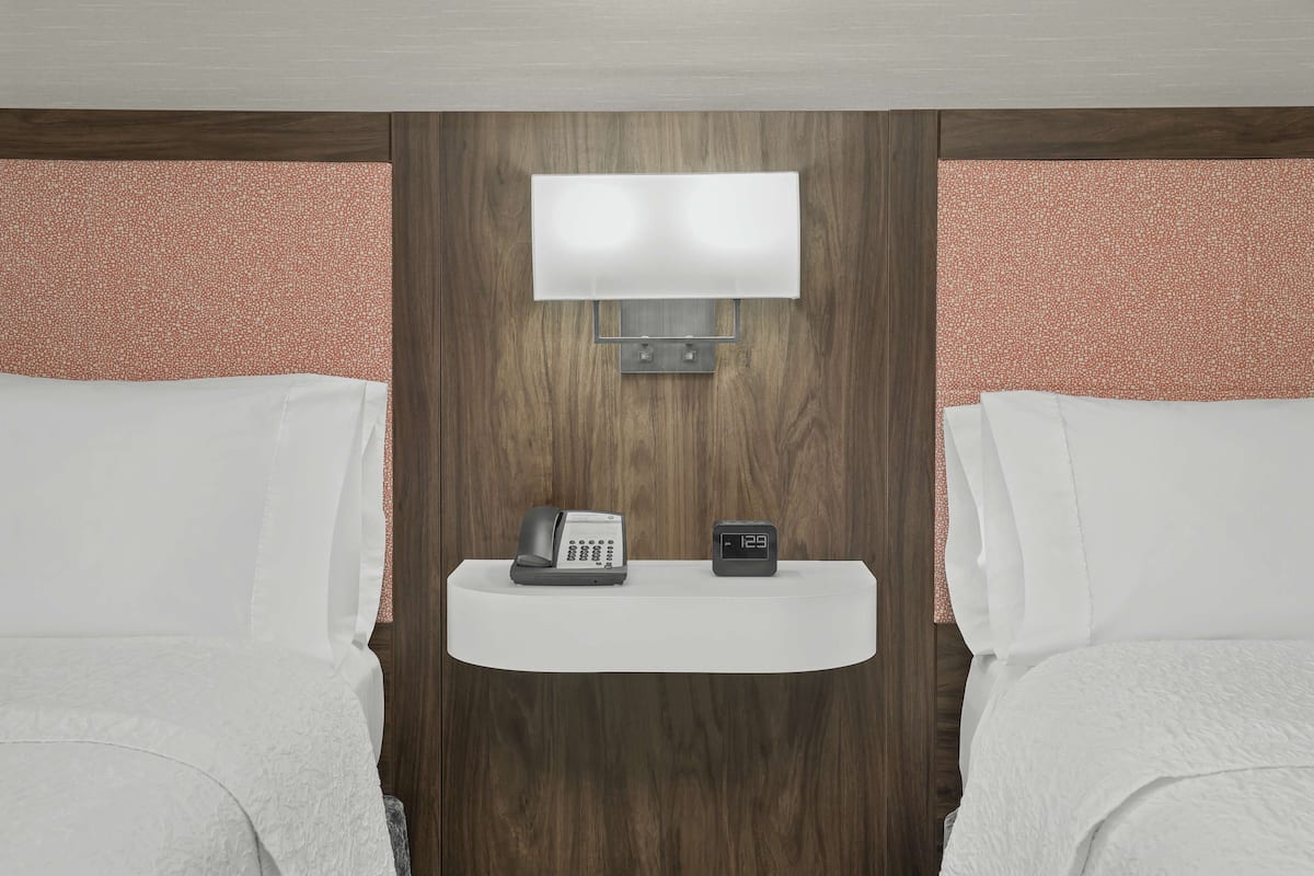 Two queen beds non smoking | In-room safe, iron/ironing board, free cribs/infant beds