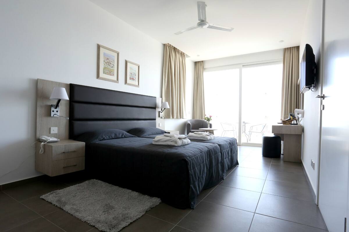 In-room safe, cribs (free), WiFi (surcharge), bed sheets