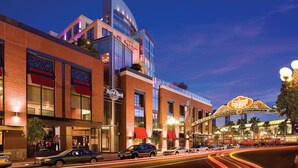 A Hard Rock Hotel with a prominent Hard Rock Cafe sign, a large marquee, and a modern building facade.