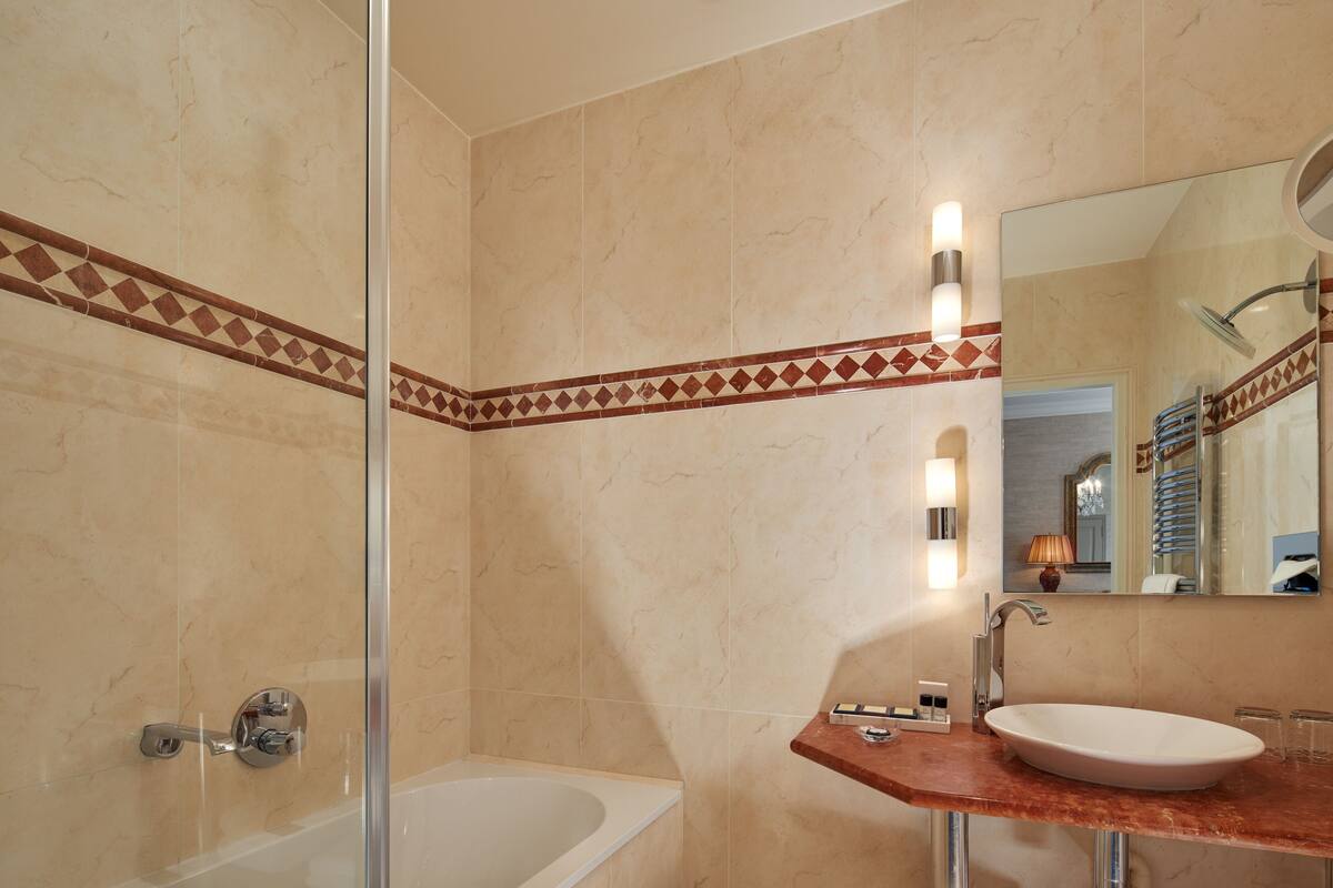 luxury room | bathroom | free toiletries, hair dryer, bathrobes, slippers