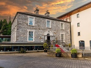 A stone building with a restaurant named 'The Old House Restaurant' in front. - Annebrook House Hotel (Mullingar)