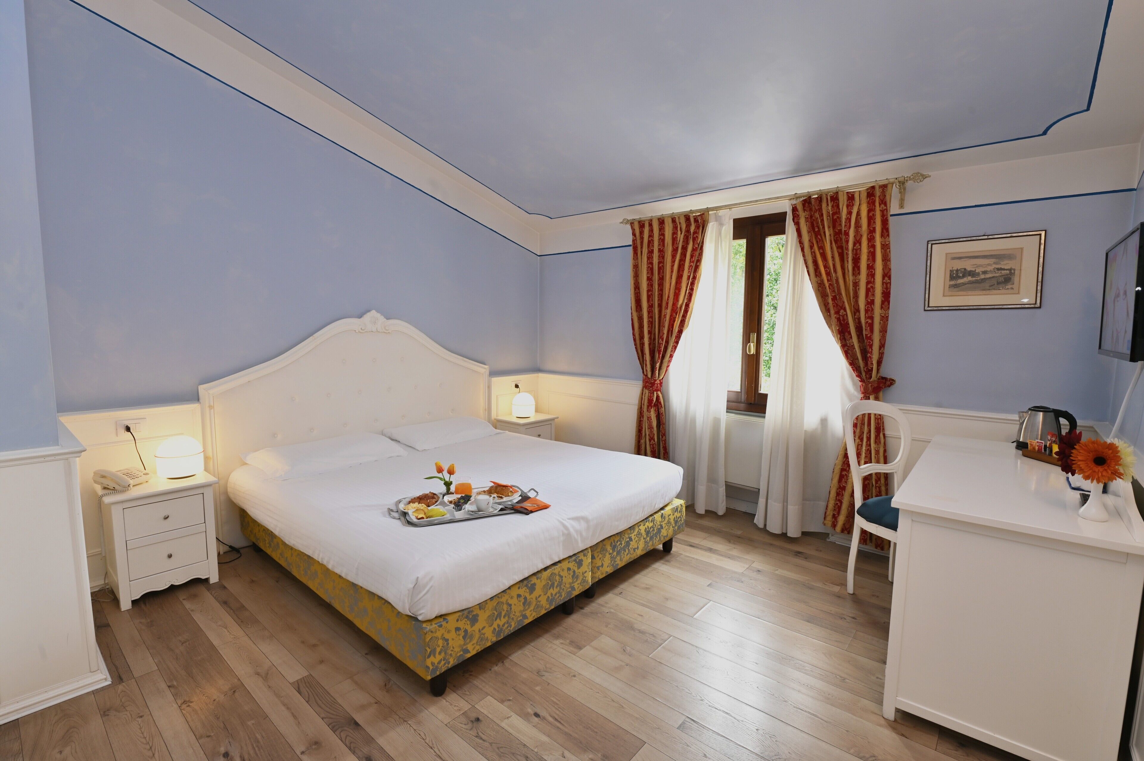 Hypo-allergenic bedding, free minibar, in-room safe, desk