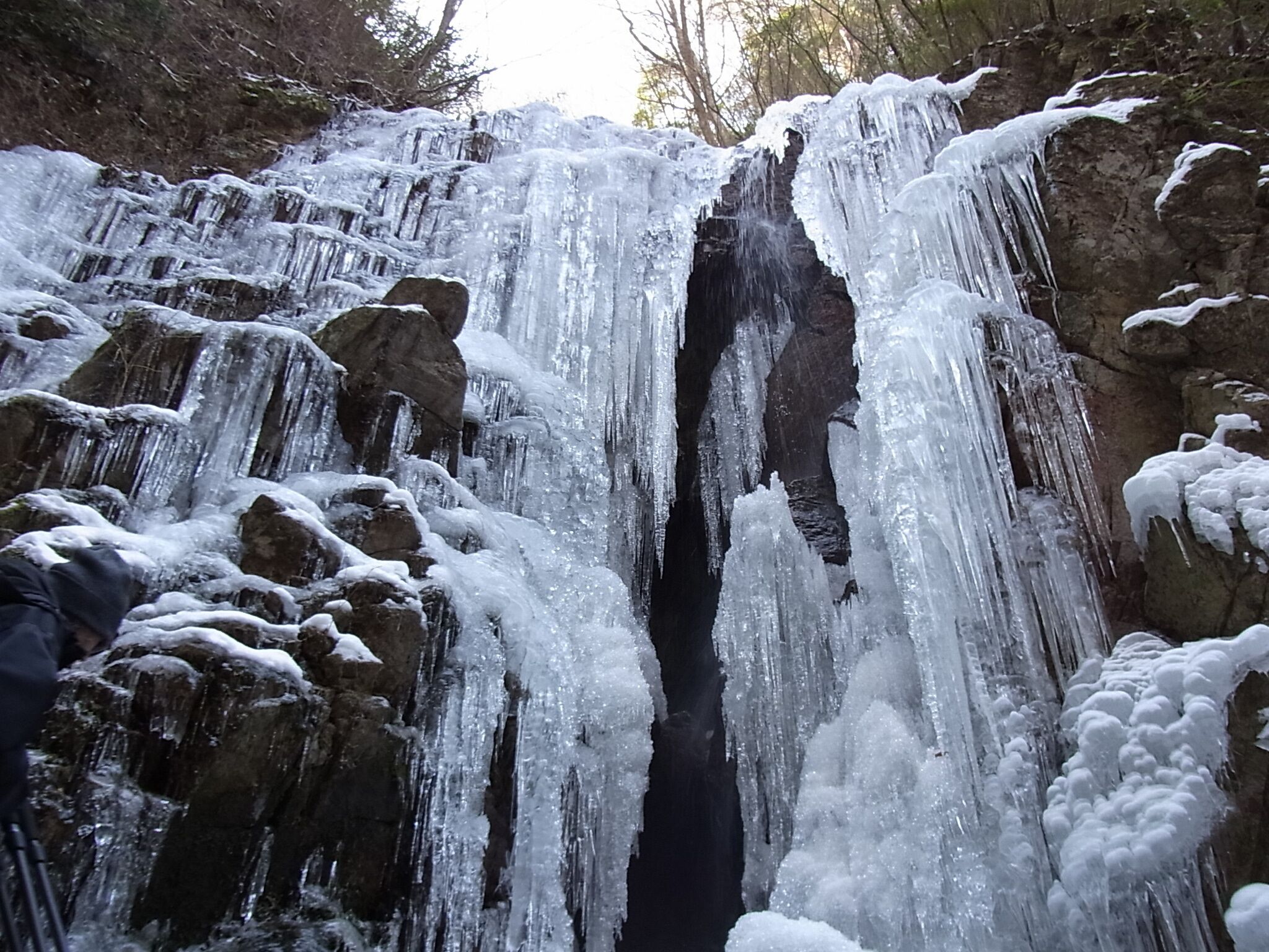 A waterfall with ice formations.