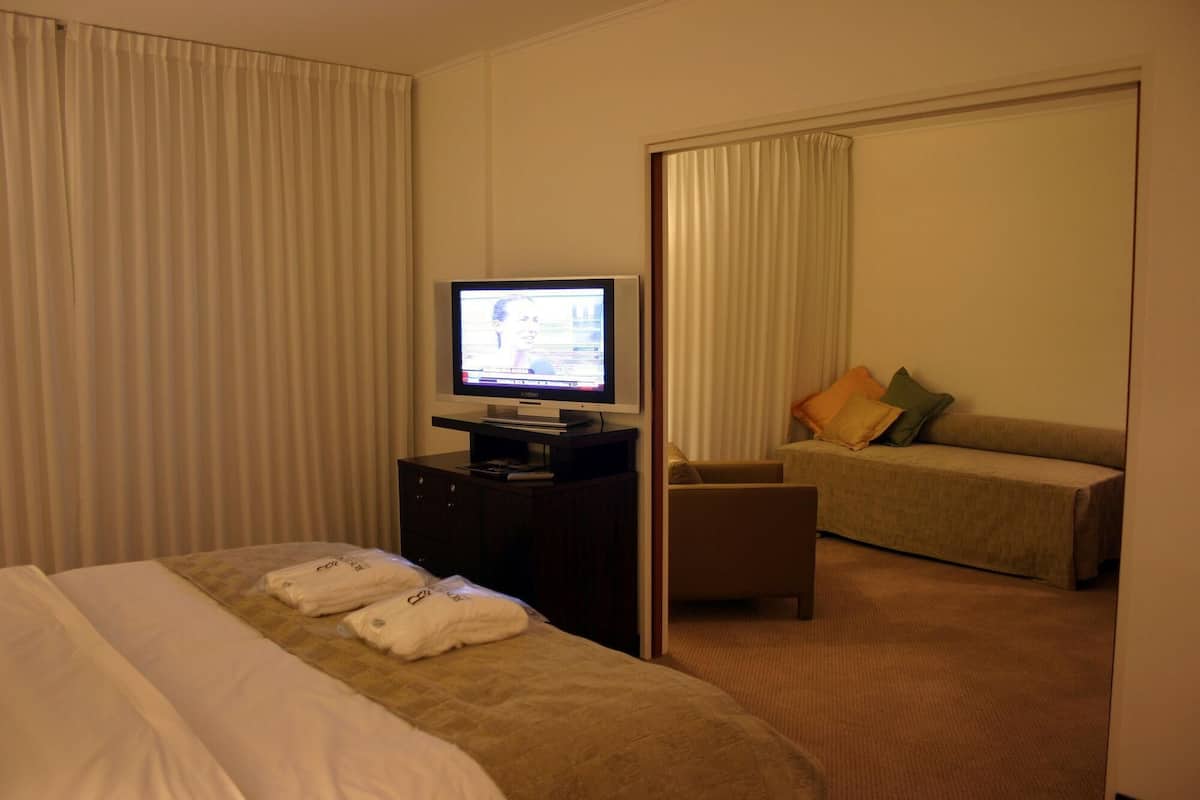 Premium bedding, down comforters, pillowtop beds, minibar