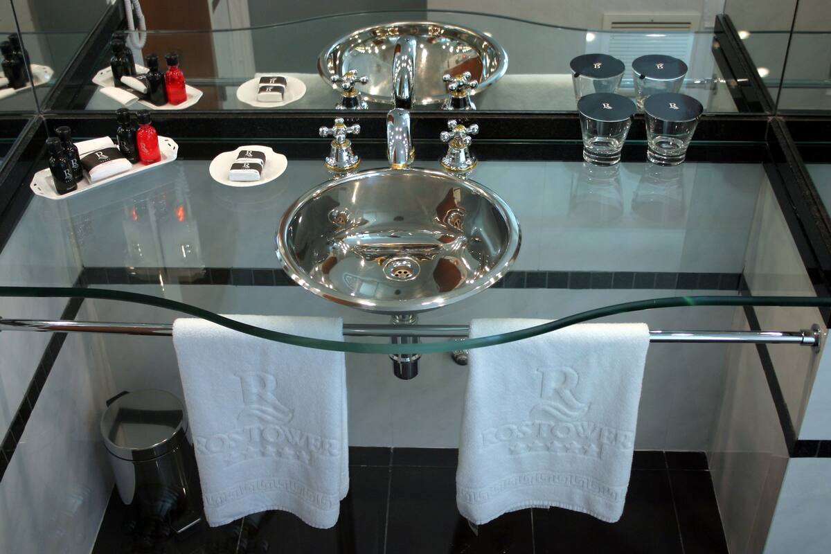 combined shower/bathtub, designer toiletries, hair dryer, bidet