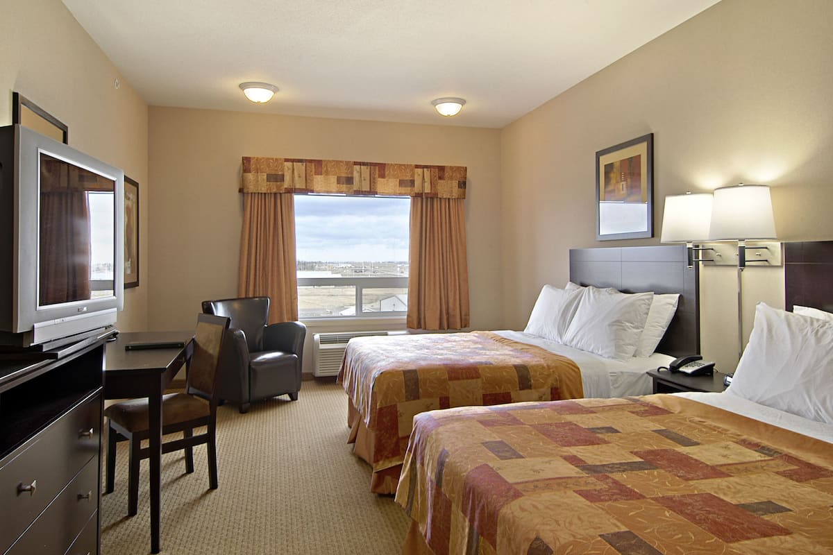 Room, 2 Queen Beds, Non Smoking | Premium bedding, down duvets, in-room safe, desk