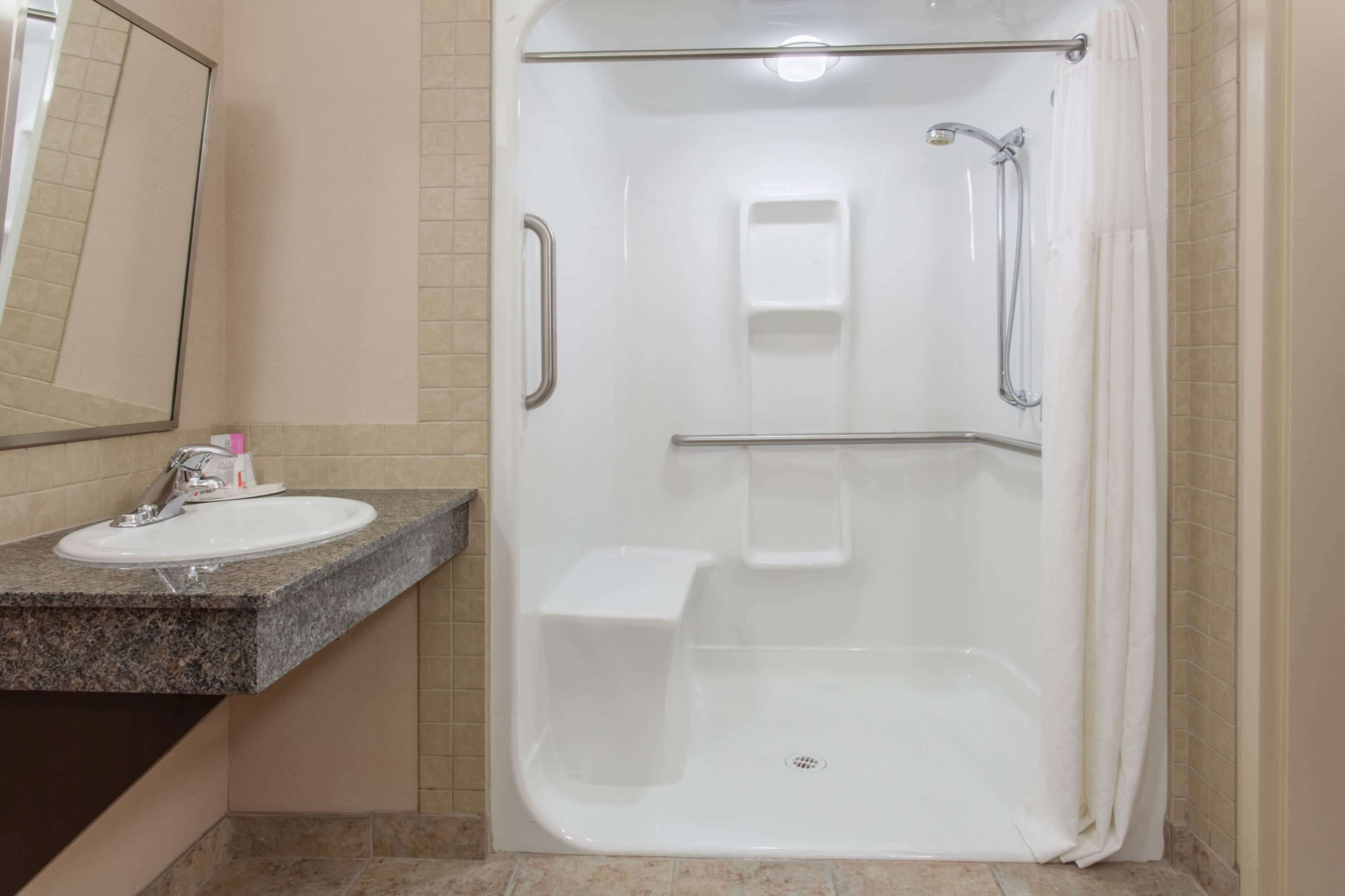 combined shower/bathtub, free toiletries, hair dryer, towels
