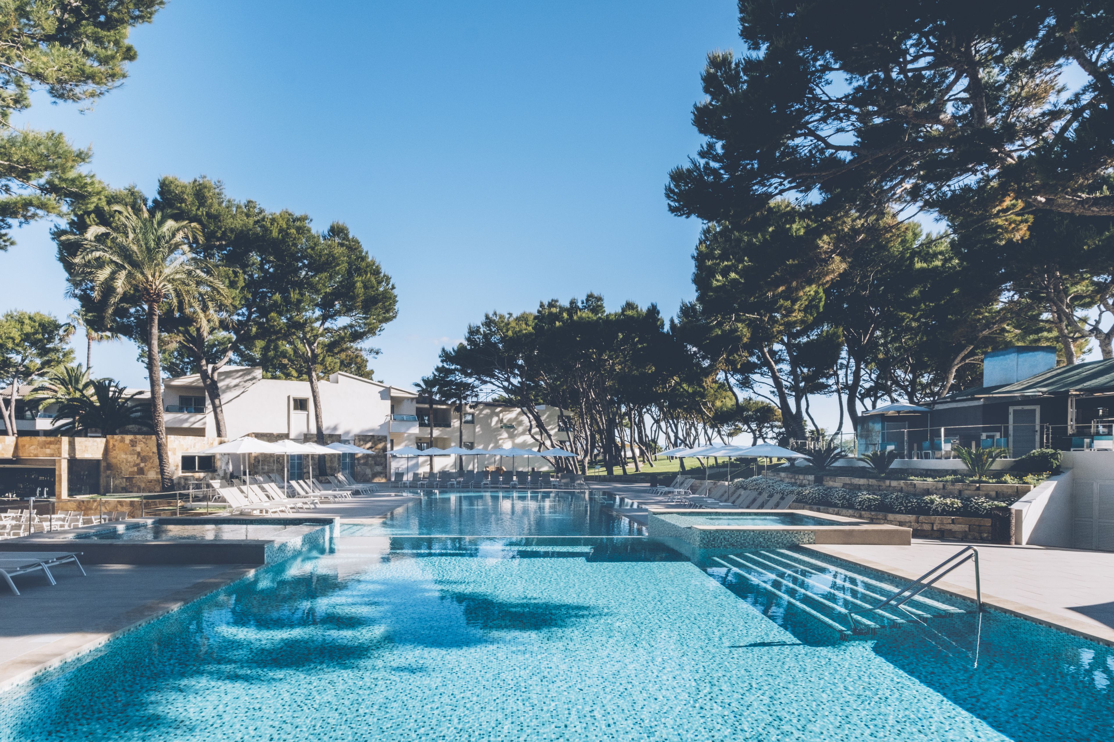 indoor pool, 2 outdoor pools, pool umbrellas, pool loungers