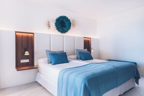 Habitación familiar (Single Use) | Minibar, caja de seguridad en la habitación, escritorio y wifi gratis 