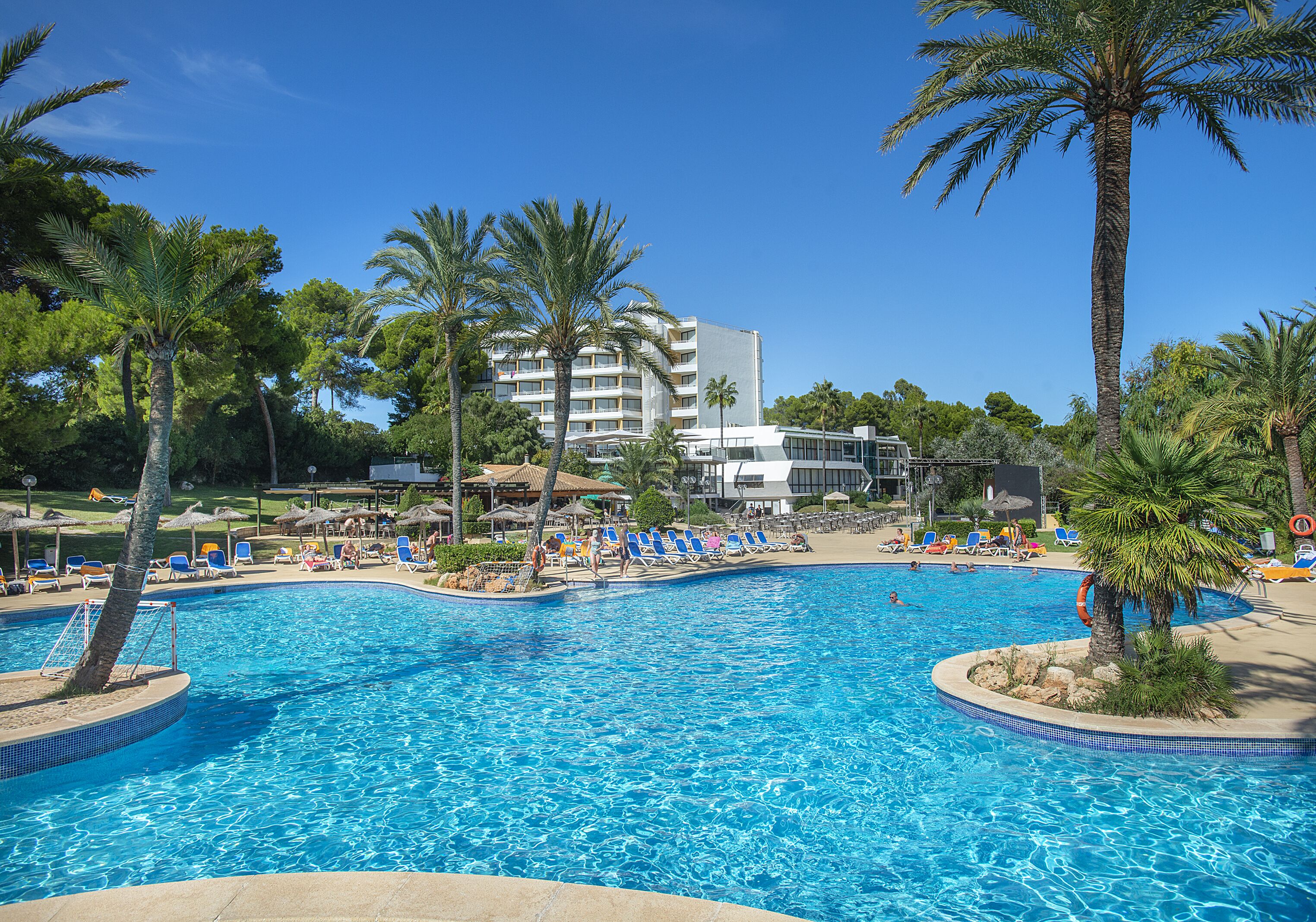 indoor pool, seasonal outdoor pool, pool umbrellas, pool loungers